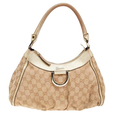 gucci gold d ring hobo|Gucci Beige/Gold GG Canvas And Leather D Ring Hobo.